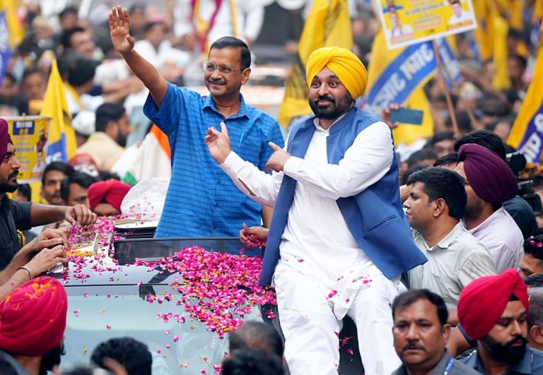 Arvind Kejriwal with Bhagwant Mann holds a roadshow for the Lok Sabha elections